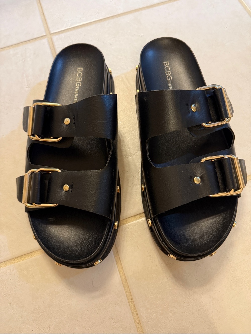 BCBGeneration Black Slide Sandals with Gold Buckles, 8.5